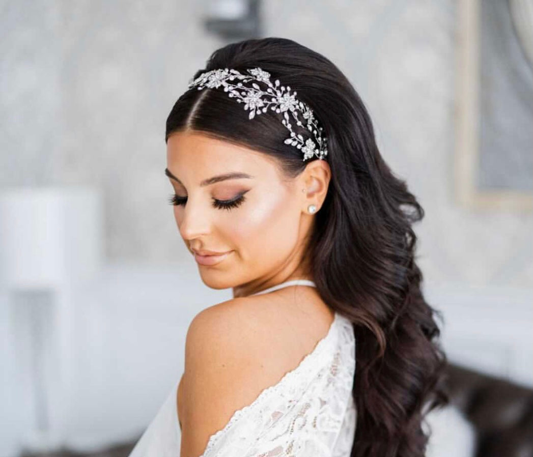 bride wearing angel bridal headpiece by christie lauren