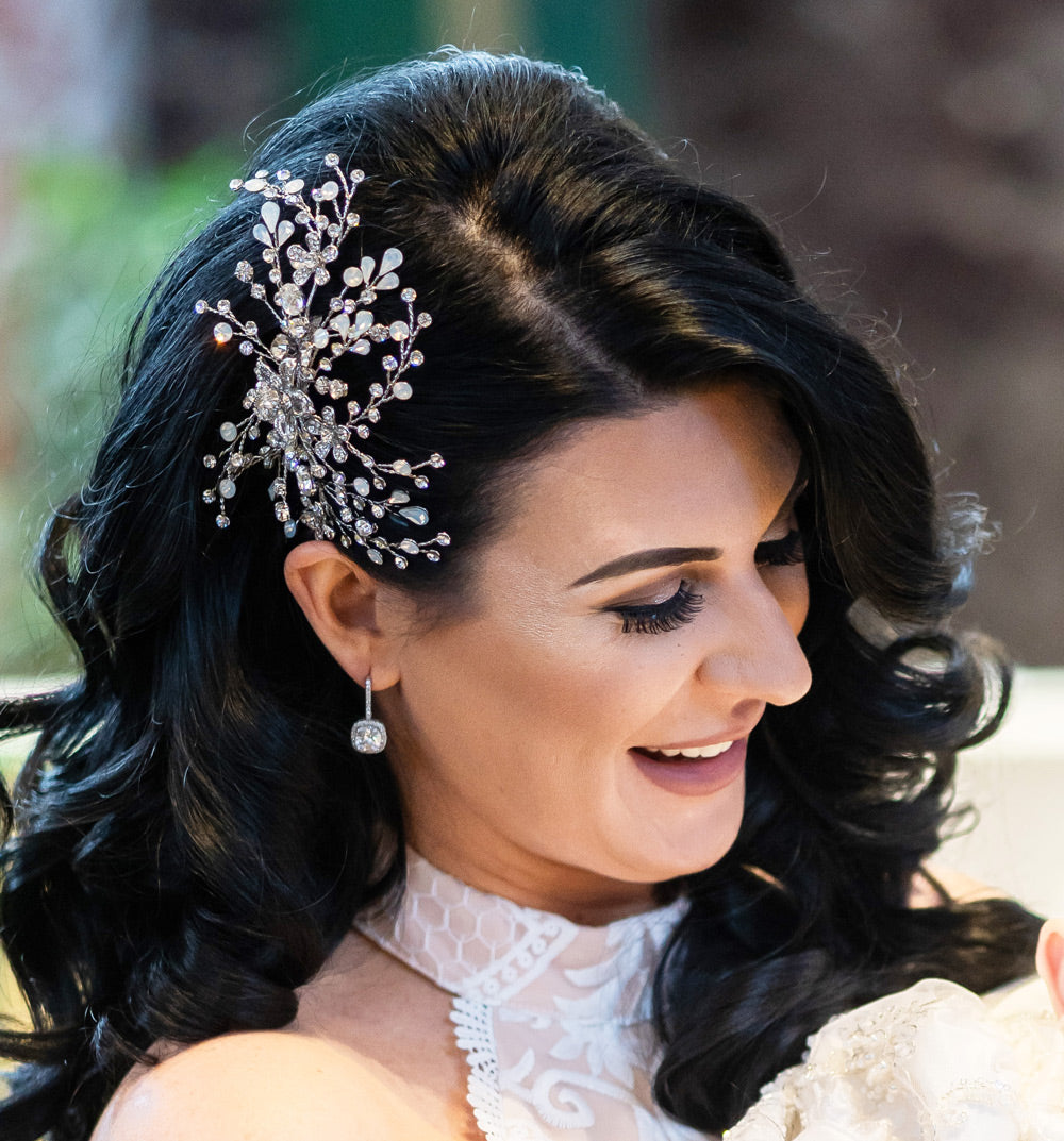 bride wearing aquarius bridal headpieces by christie lauren