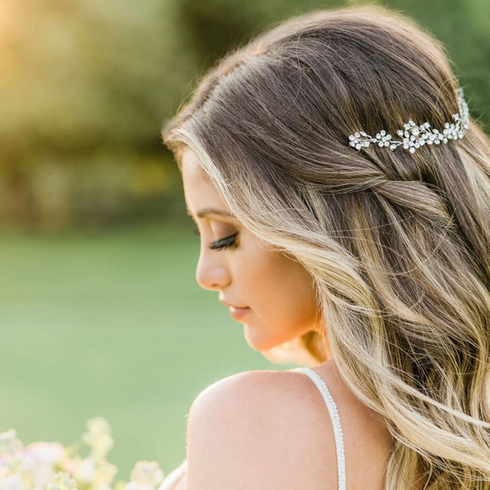 
                      
                        woman wearing christie lauren single vine headpiece
                      
                    