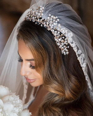 bride wearing half renni stone bridal headpiece by christie lauren